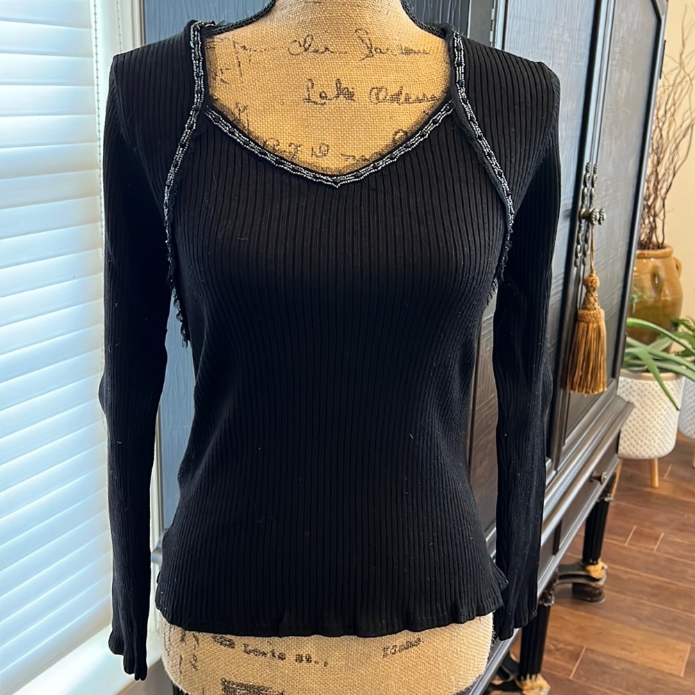 Black knit top with lace and bead details. Super cute.